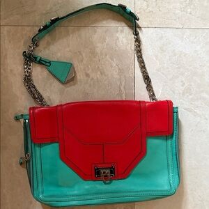 The Rebecca Minkoff “The Allie” Red and Teal Leather Shoulder Bag
